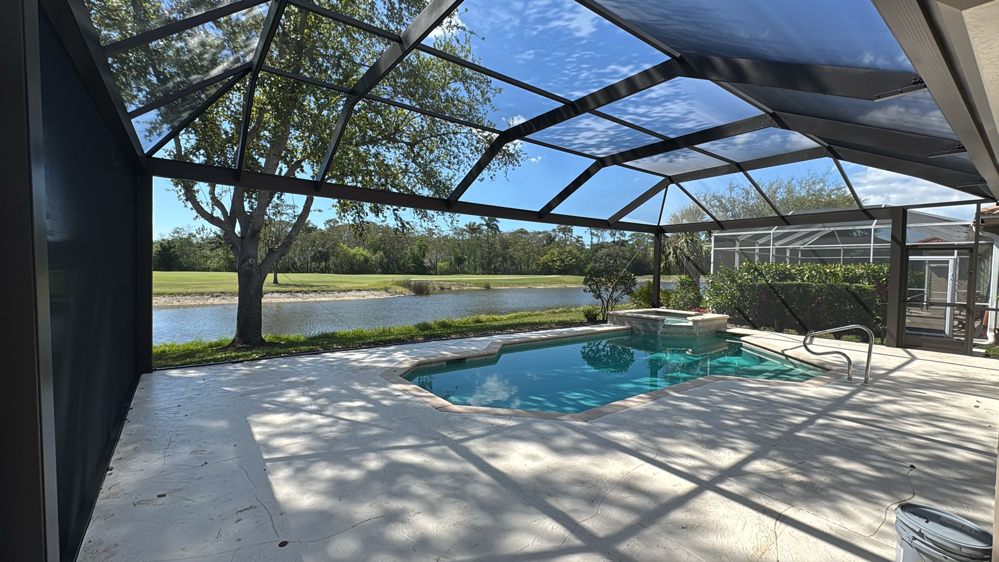 panoramic screen enclosure with a lake view