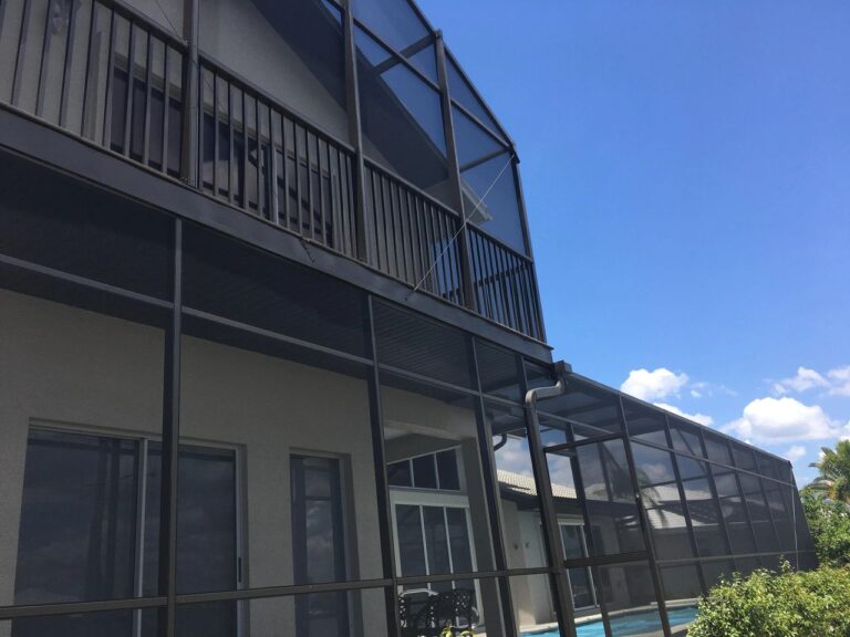 Outdoor mesh enclosure under blue sky