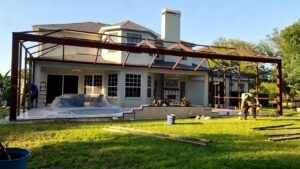 Backyard renovation with pool cover